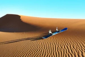 Sandboarding activity for students in Morocco